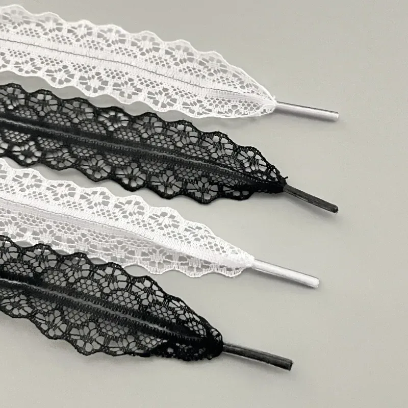 Lacets plats en nylon noir et blanc, 1 paire